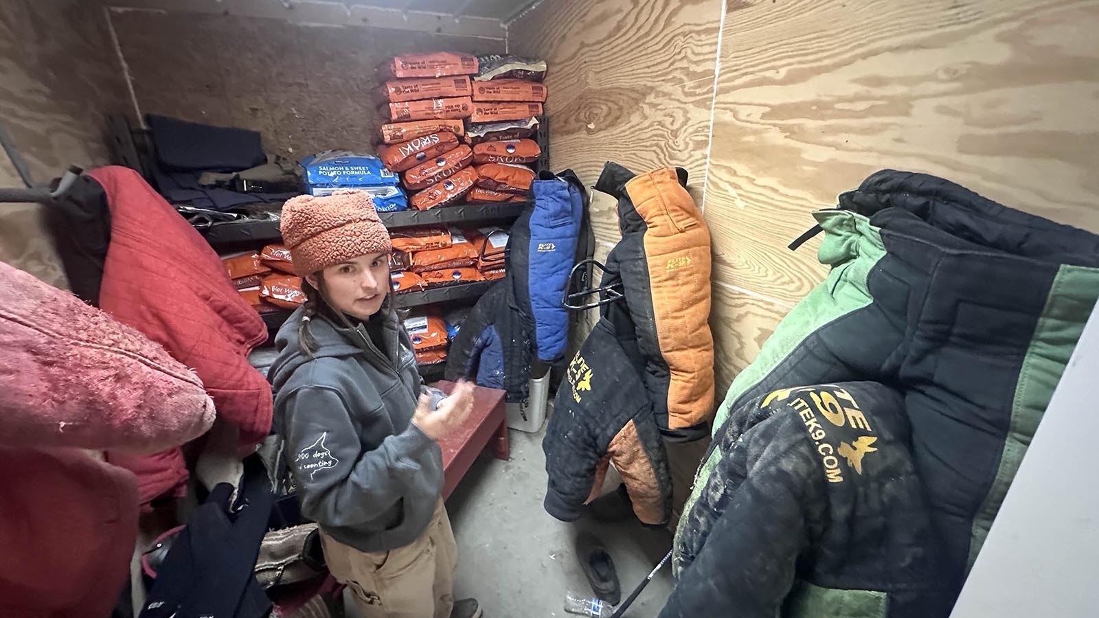 Svalinn trainer Indi Dubay works with a four-month-old pup named Cayenne, and shows off the bite suit room and fresh meat donated by a local butcher.