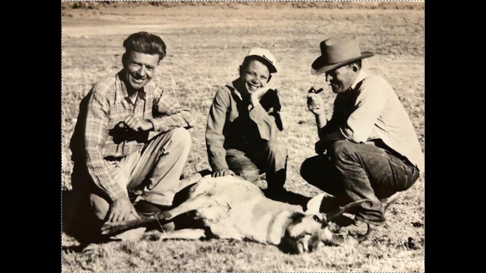 Dr. Olaus Murie, Jim Harrower Jr. and Jim Harrower getting antelope for a Smithsonian exhibit.