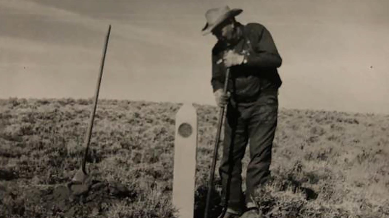 19.	Jim Harrower placing an Oregon Trail marker.