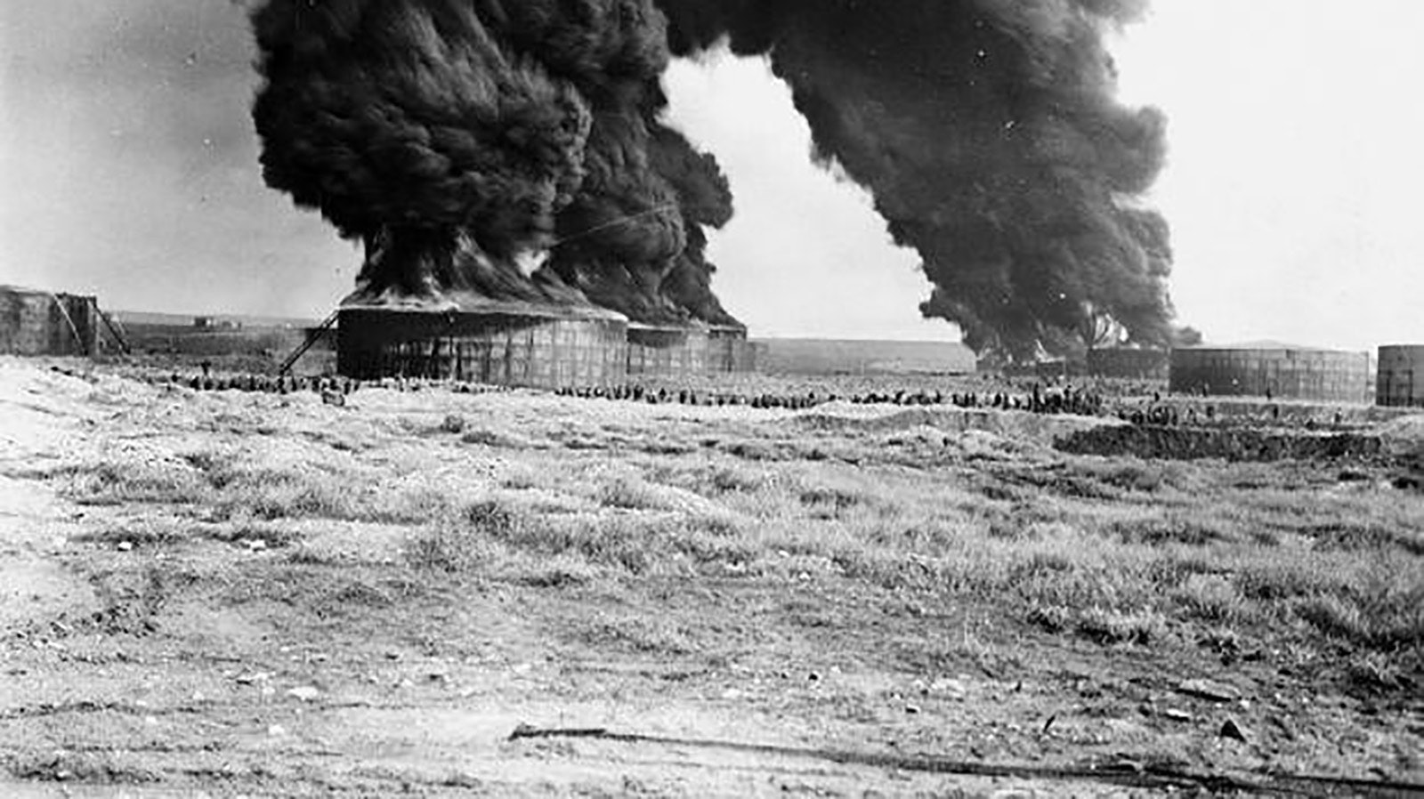 Hundreds of men were involved in the efforts to keep the oil tank fires from spreading and causing further economic loss to the oil company.