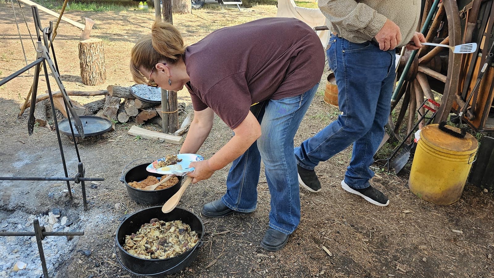 Deb Herman scoops up potatoes and some of their award-winning chicken-fried steak.