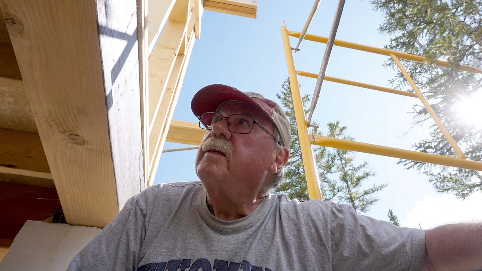 Dave Simpson, pictured, and Larry Ash, both 74, worked together to build a cabin in Wyoming’s remote Snowy Range mountains 44 years ago and made a pact to build another. Decades later, the retirees are making good on that promise.