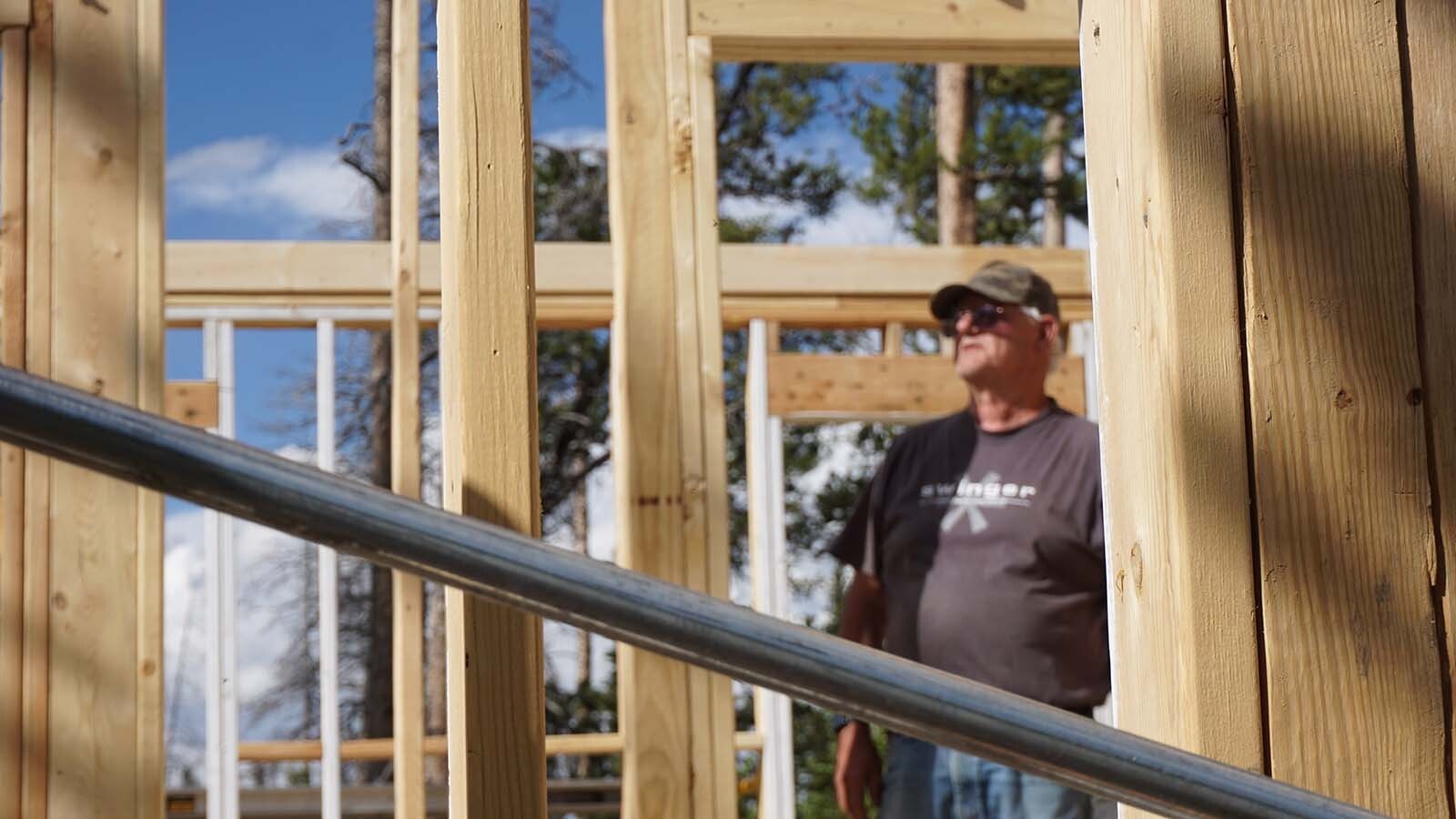 Dave Simpson and Larry Ash, pictured, both 74, worked together to build a cabin in Wyoming’s remote Snowy Range mountains 44 years ago and made a pact to build another. Decades later, the retirees are making good on that promise.