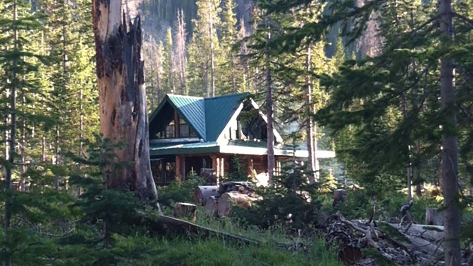 Dave Simpson and Larry Ash built the log cabin a short way from Larry’s 40 years ago.