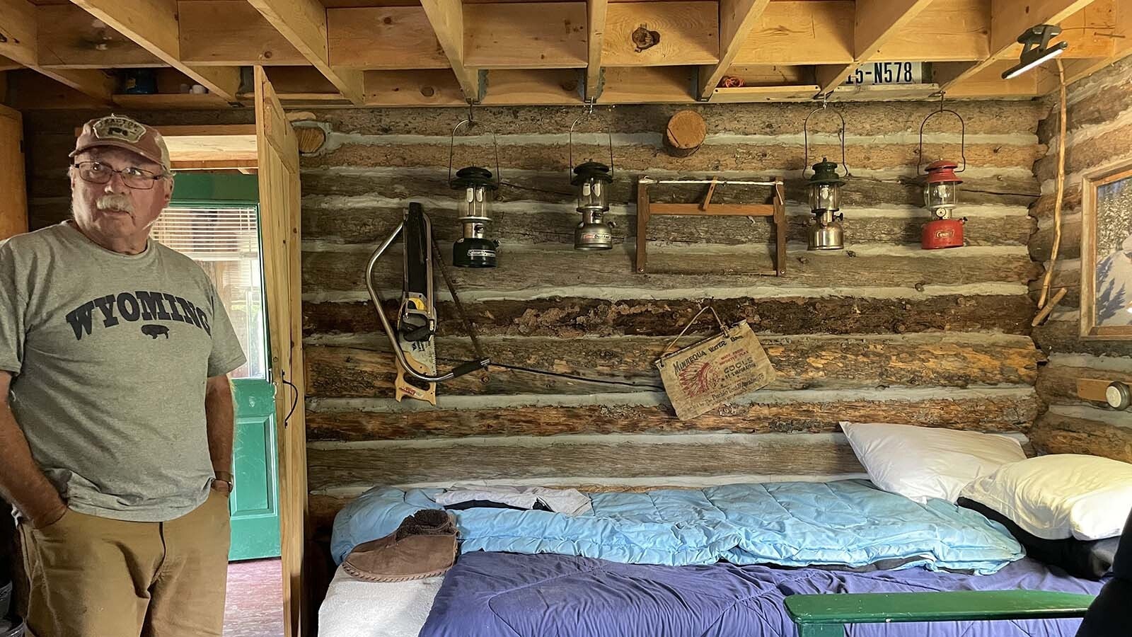 Dave Simpson, pictured, and Larry Ash, both 74, worked together to build a cabin in Wyoming’s remote Snowy Range mountains 44 years ago and made a pact to build another. Decades later, the retirees are making good on that promise.