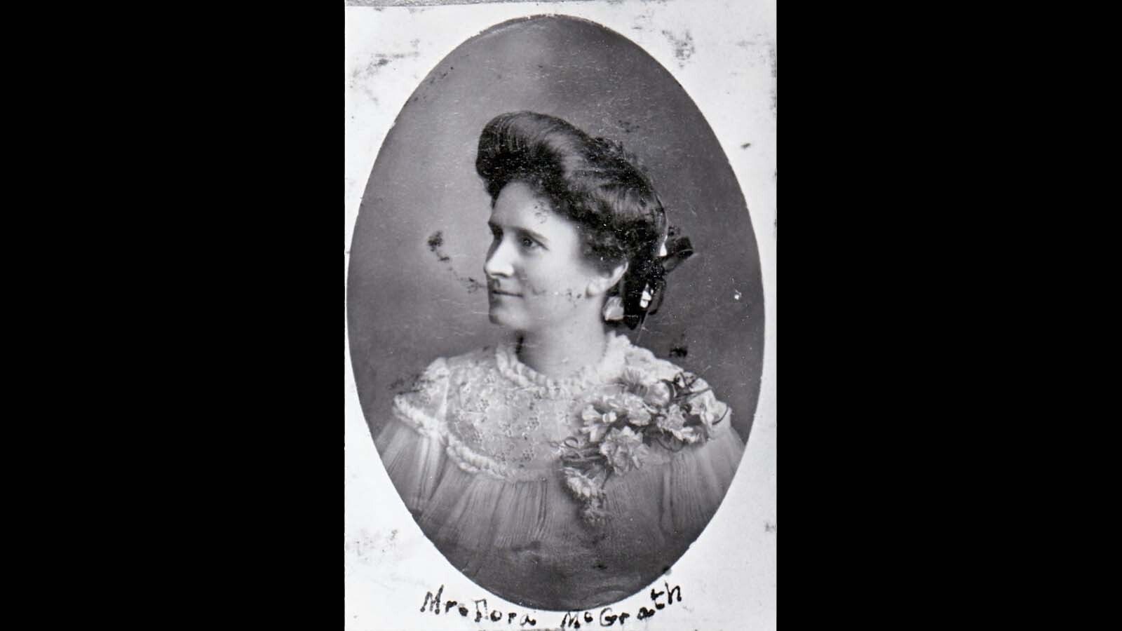 Dora Barker McGrath of Glenrock, Wyoming, was a young woman in her early 30s in 1899 when her husband, James Barker, was killed in front of her, apparently over a dispute about their children’s barking dog. When the coal miners Barker worked with formed a mob to lynch his murderer, she was able to stop them by reminding them that their families would suffer.