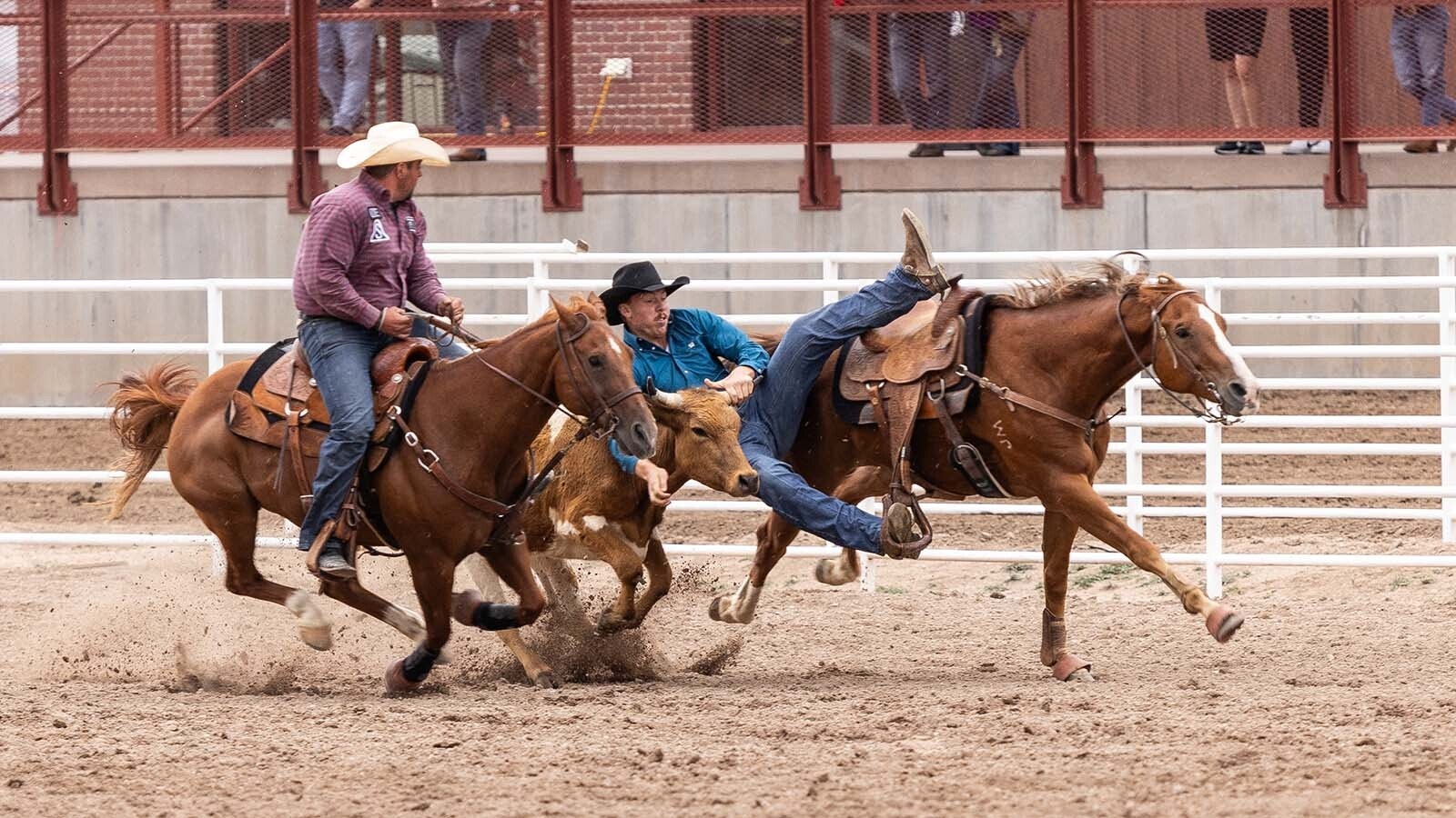 Team roping during the rodeo at the 2024 Cheyenne Frontier Days.
