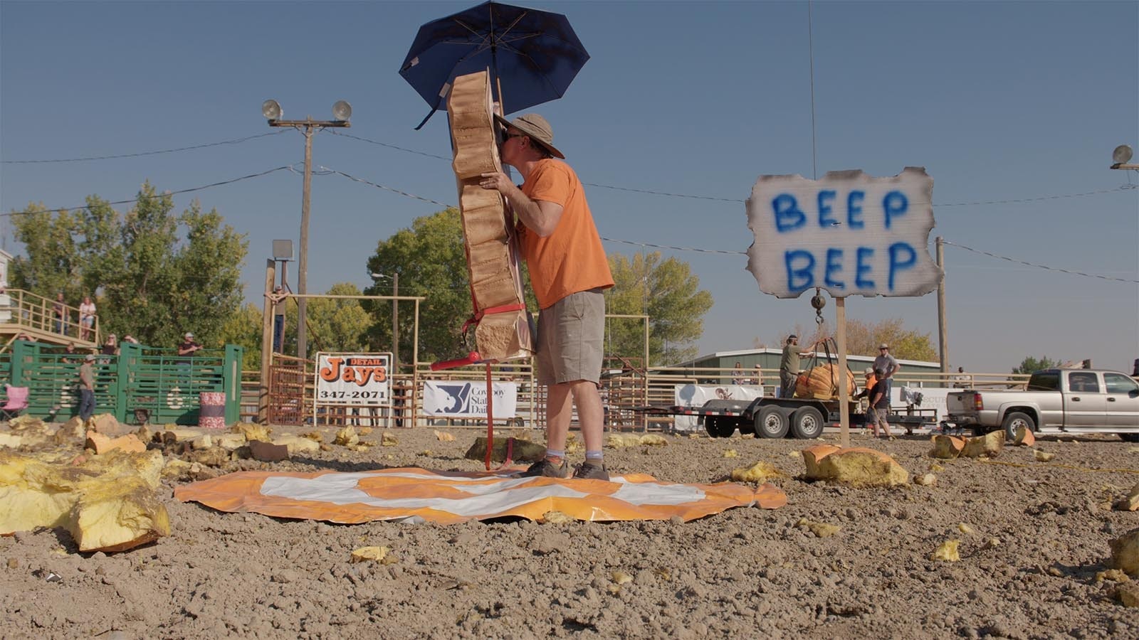 Event organizer Jay Richard kisses a cutout of Wile E. Coyote prior to it being obliterated by a giant pumpkin on Oct. 5, 2024.