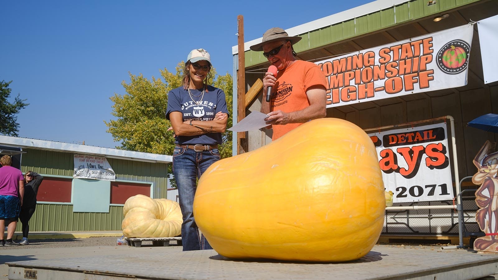 Competitor Tammy Groth waits to find out how much her pumpkin weighs at the 2024 Wyoming State Pumpkin Weigh-Off on Oct. 5, 2024.