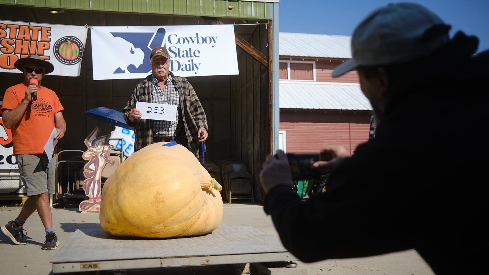 Competitor Scott Lewis finds out his pumpkin weighs 253 pounds at the 2024 Wyoming State Pumpkin Weigh-Off on Oct. 5, 2024.