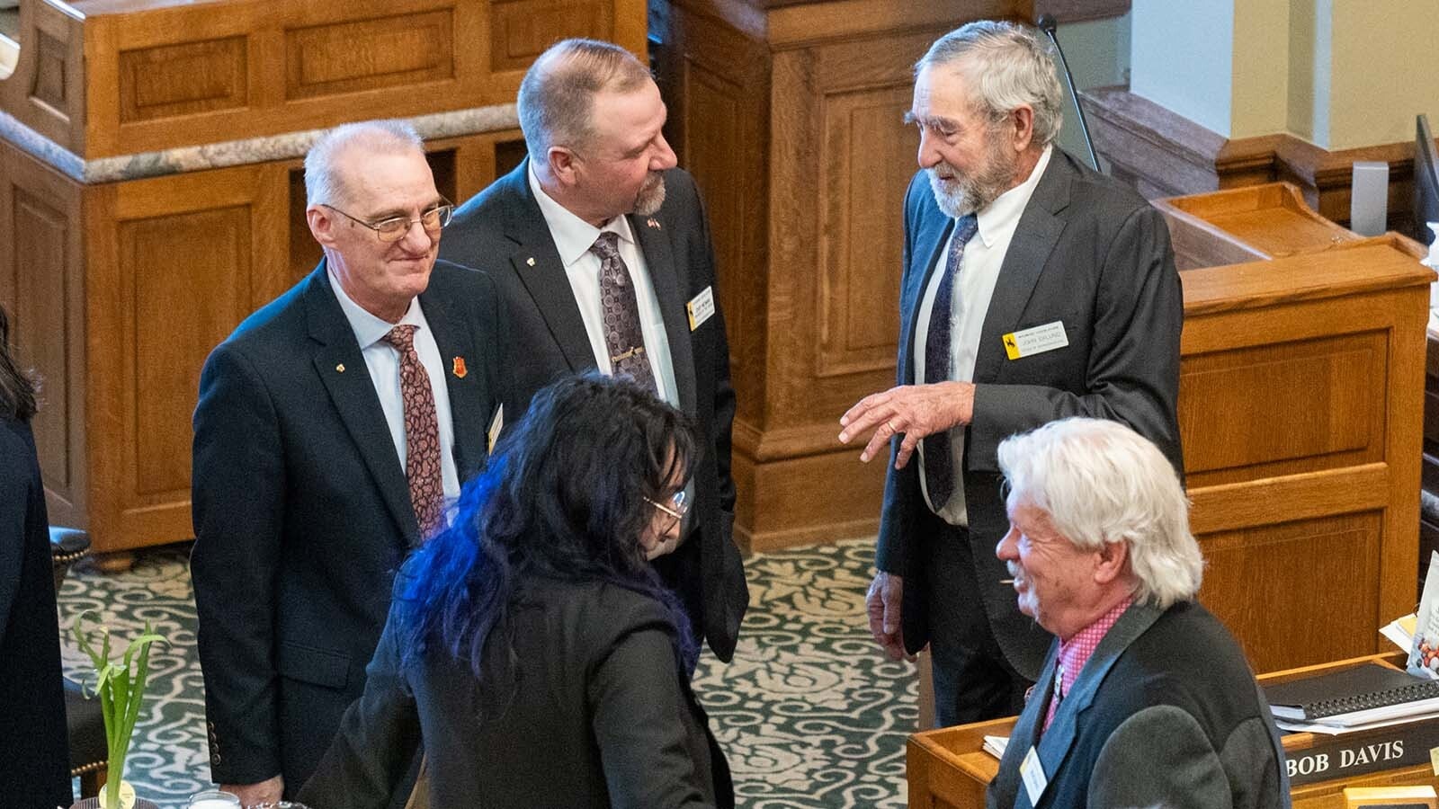 Cheyenne-area state Rep. John Eklund died early Friday morning, multiple state lawmakers have confirmed to Cowboy State Daily. Eklund, 74, had been battling cancer for years, his wife Suzi confirmed Friday. Here Eklund, top right, is seen during the 2025 legislative session with, clockwise from bottom right, Reps. Bob Davis, Karlee Provenza, Ken Pendergraft, and Chip Neiman.
