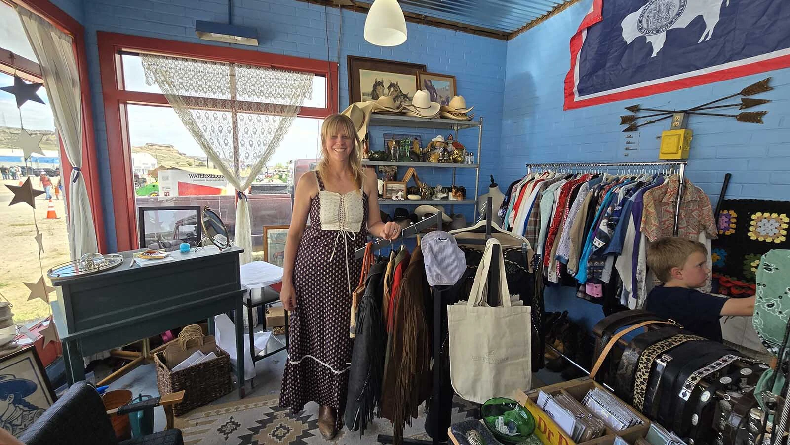 Claudia Borchardt used to have all the clothes stashed in totes in her basement. Now she's got them properly displayed in a boutique Western vintage clothing shop she just opened in the tiny town of Chugwater.