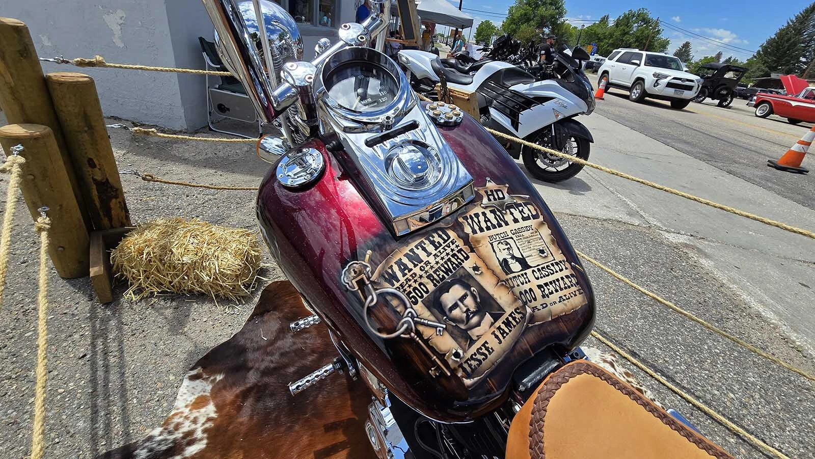 Posters of Butch Cassidy and Jesse James are part of the airbrushed artwork on the Wanted Dead or Alive Harley Davidson built by retired Torrington lawman Randy Giles.