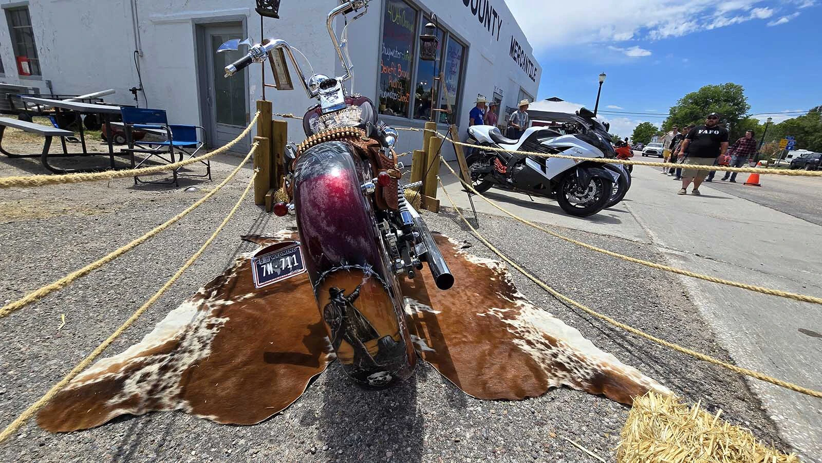 A lone gunman with both pistols out and Devils Tower in the background decorates the rear fender of this Wanted Dead or Alive Harley Davidson built by retired Torrington lawman Randy Giles.