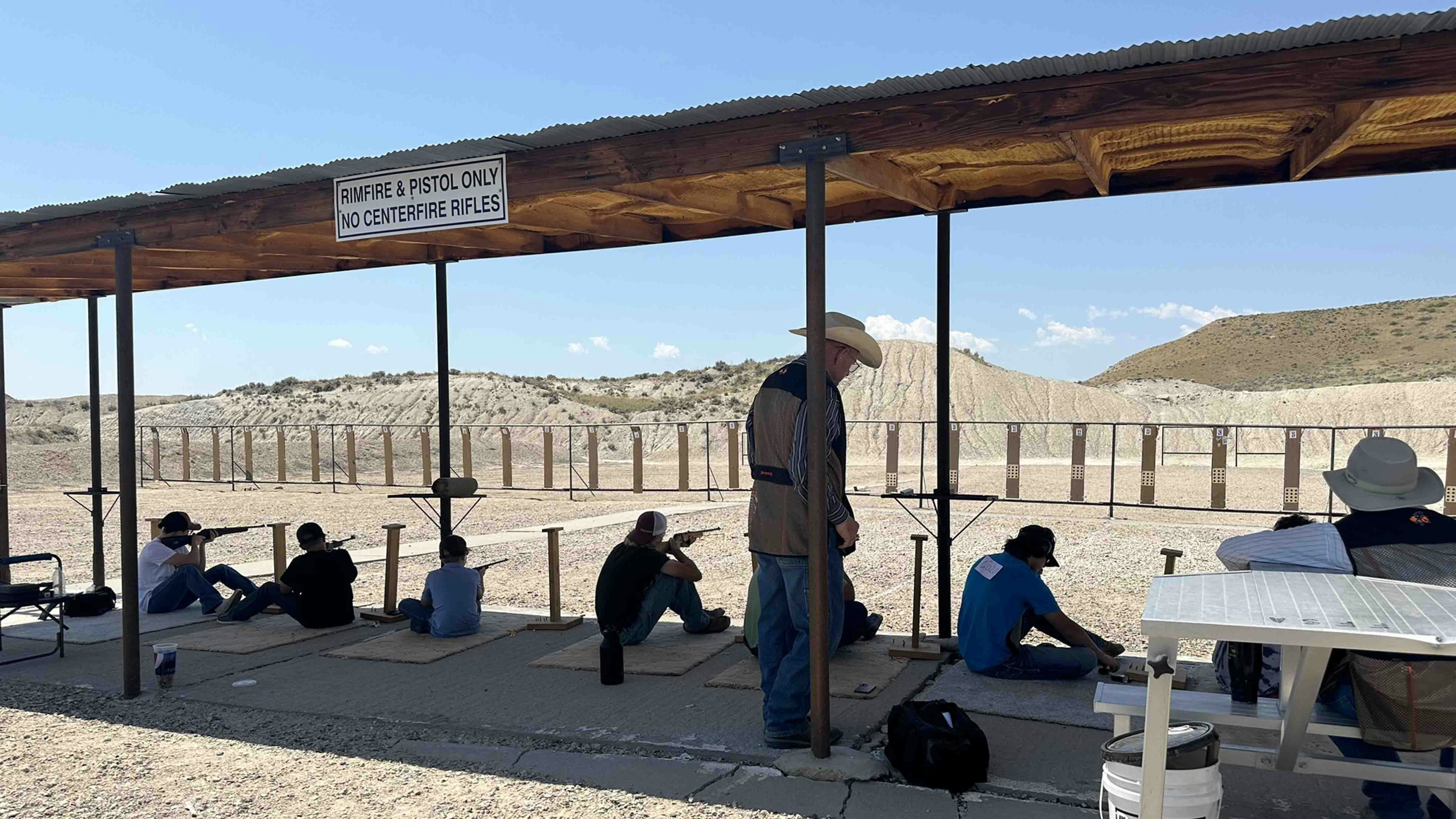 Range Officials keep a close eye on 4H competitors on the .22 Range in Douglas at the Wyoming State Shoot