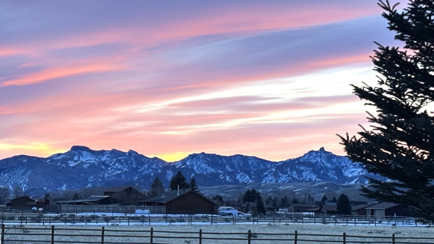 "Sunrise over Sheep Mountain, Wapiti, WY."