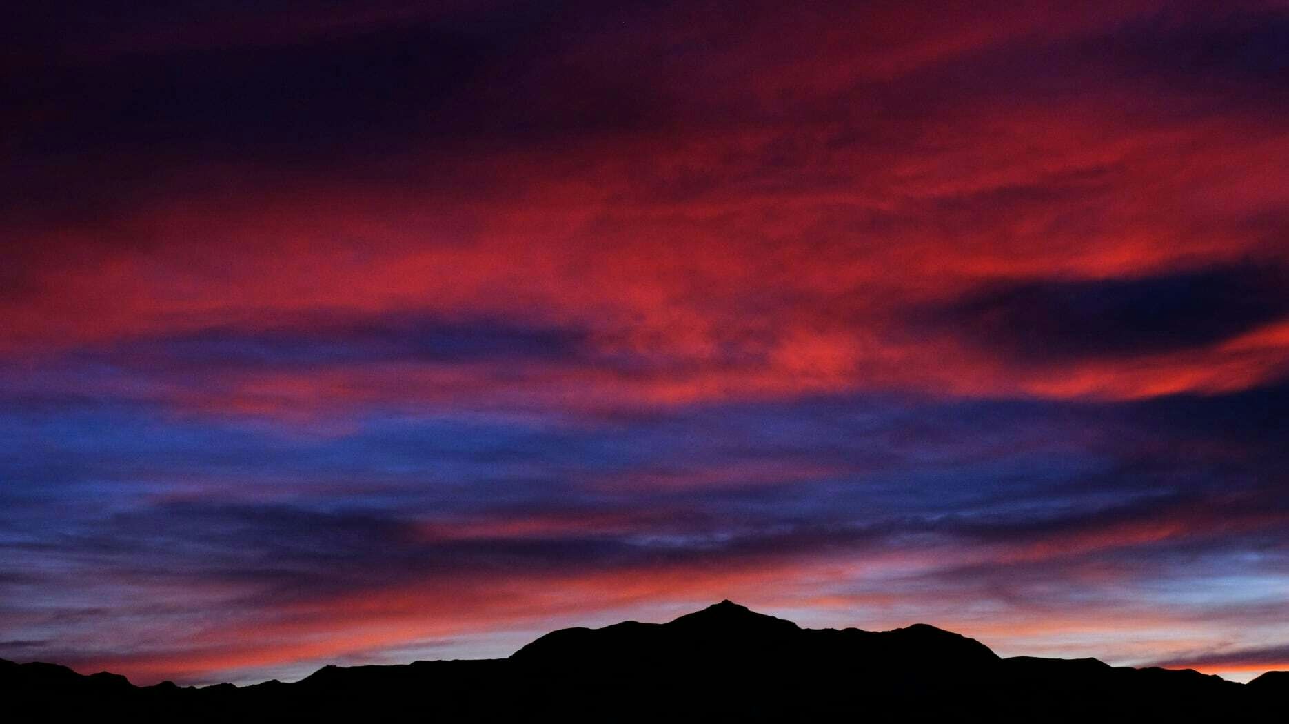 "This morning's sunrise over the McCullough Peaks northeast of Cody. We are fortunate to get a beautiful sunrise most days."