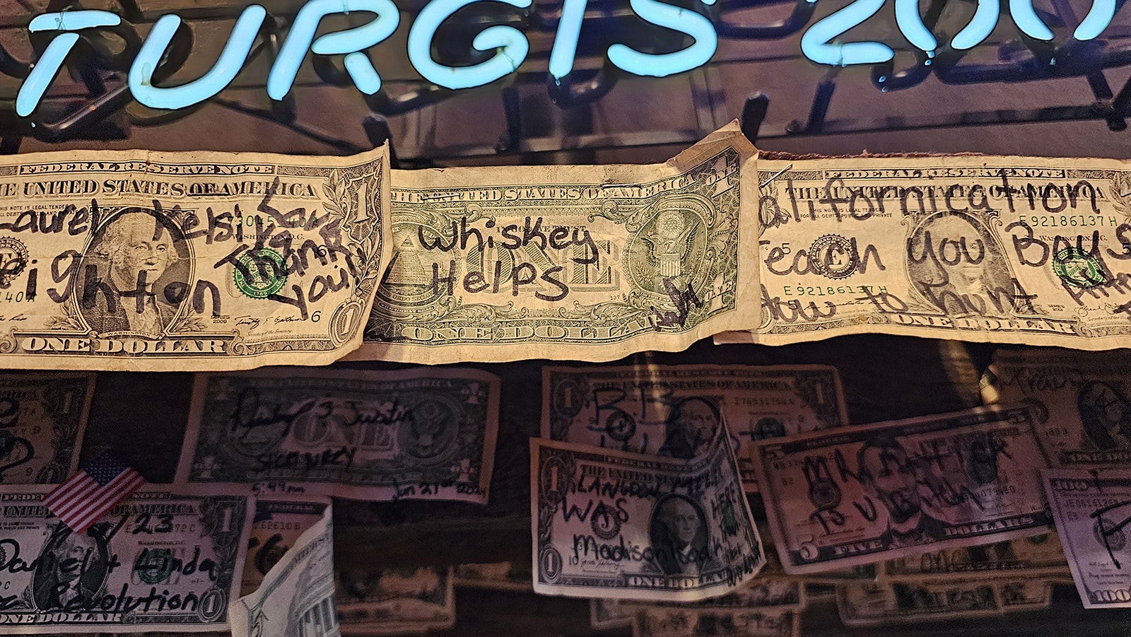 No one knows how the dollar messages got started at 3 Sisters Truck Stop. One person tacked up a dollar, and then another person did it, and suddenly it was a thing.