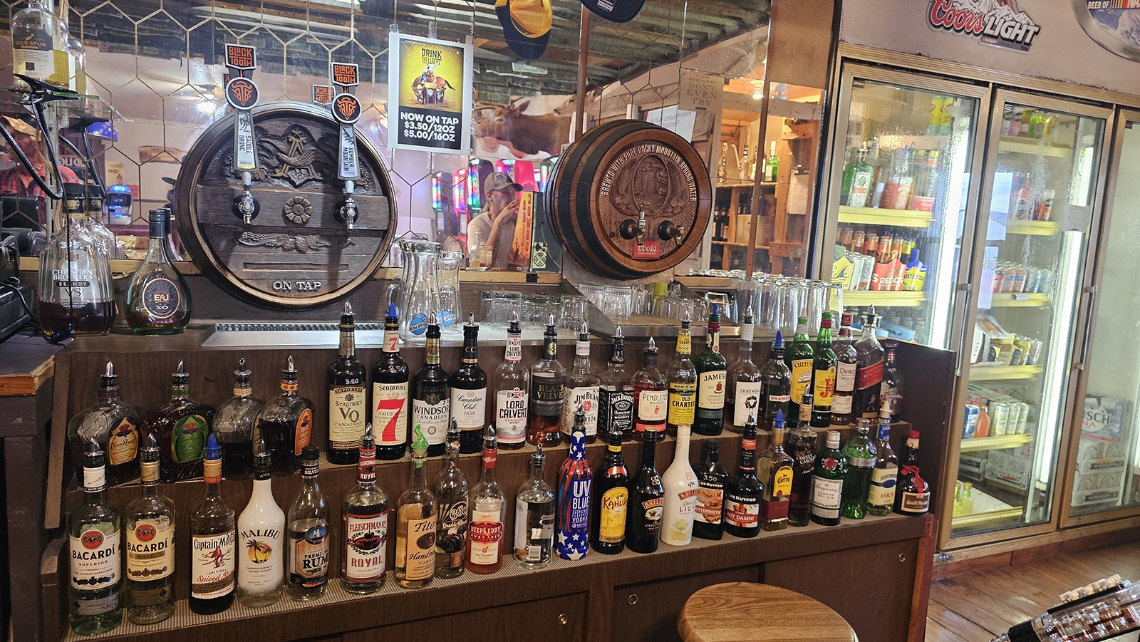 A variety of liquors are available at 3 Sisters Truck Stop's bar. Two local Wyoming brews are also on tap.