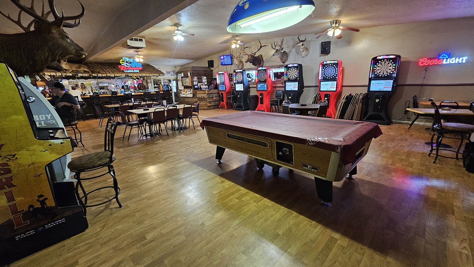 There's a pool table, Cowboy Skill Games, and darts at the 3 Sisters Truck Stop in Wyoming.