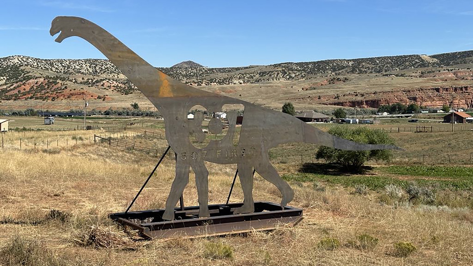 A 307 First silhouette of a dinosaur installed along U.S. Highway 20 near Thermopolis. There are plans to install more steel silhouettes throughout Wyoming, but the ones already installed have succeeded in increasing awareness of the initiative to strengthen Wyoming's economy by keeping money in local communities.