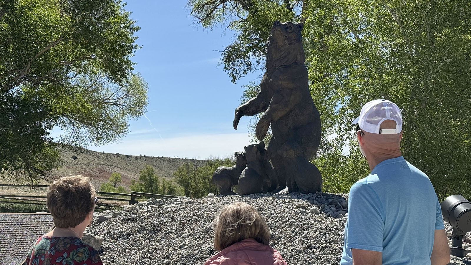 Visitors admire the bronze sculpture of Grizzly 399 and her four cubs in Dubois. The sculpture was funded by the Grizzly 399 Project, an initiative of the Deidre Bainbridge Wildlife Fund.