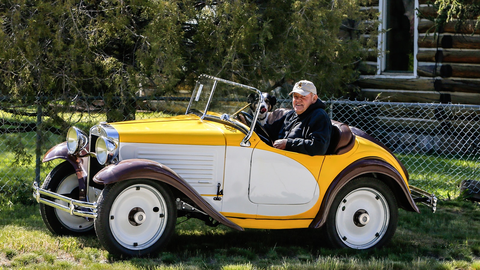 As an 18-year-old Robert “Bob” Harrower did the unthinkable as he and buddies dealt with the aftermath of an United Airlines flight crash at the top of Medicine Bow peak. Here, Harrower sits in a 1930 American Austin that he totally restored and painted yellow and brown to match the University of Wyoming colors.