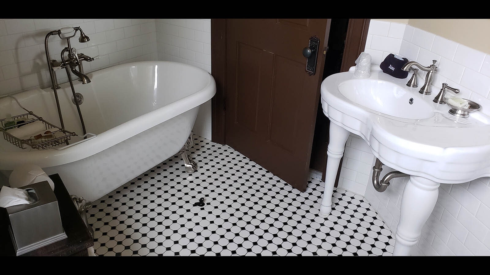 A clawfoot tub and porcelain sink are a nice touch, but still offer all the modern amenities today's travelers expect.