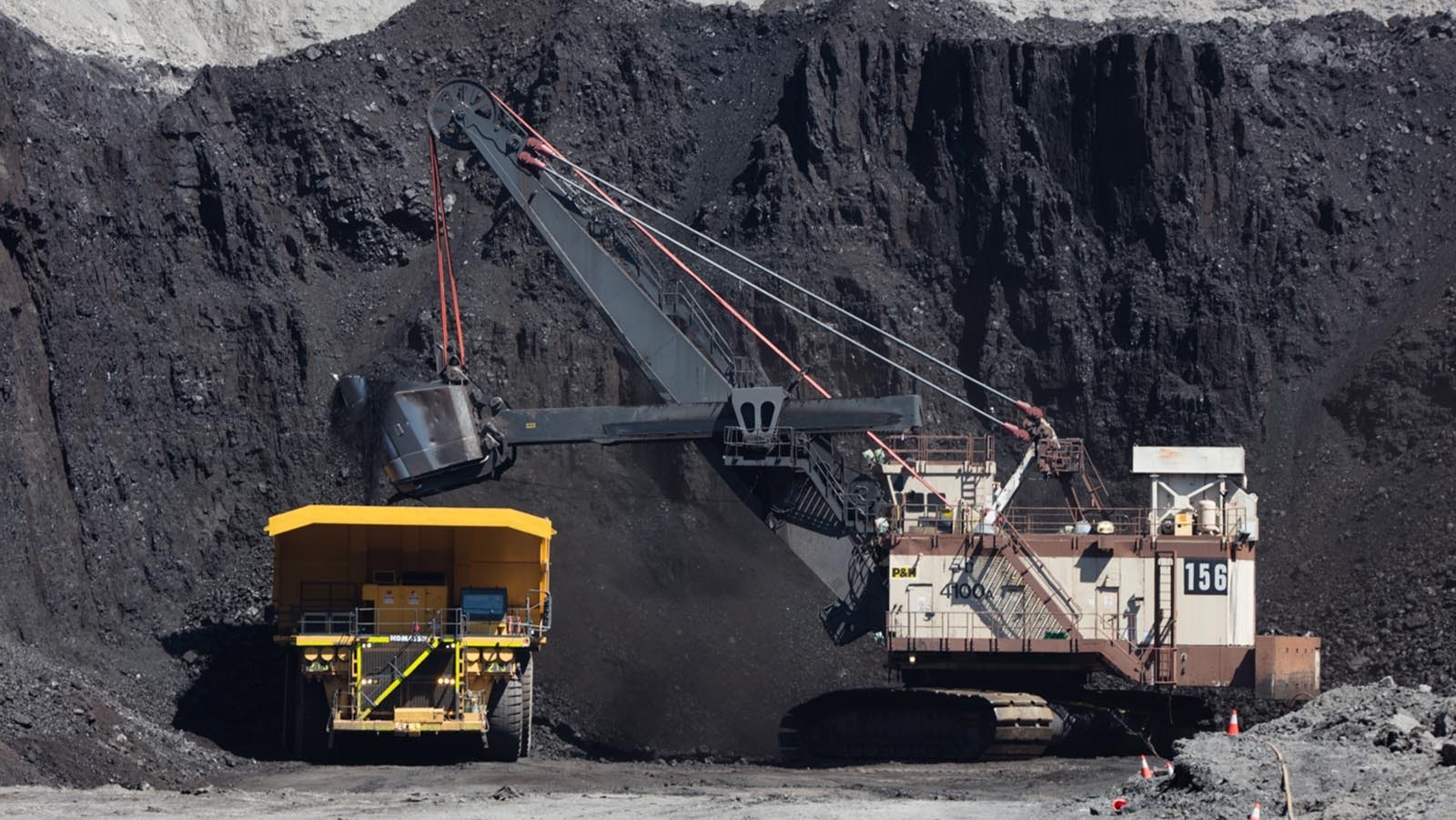 A large coal shovel fills a haul truck at the North Antelope Rochelle Mine.