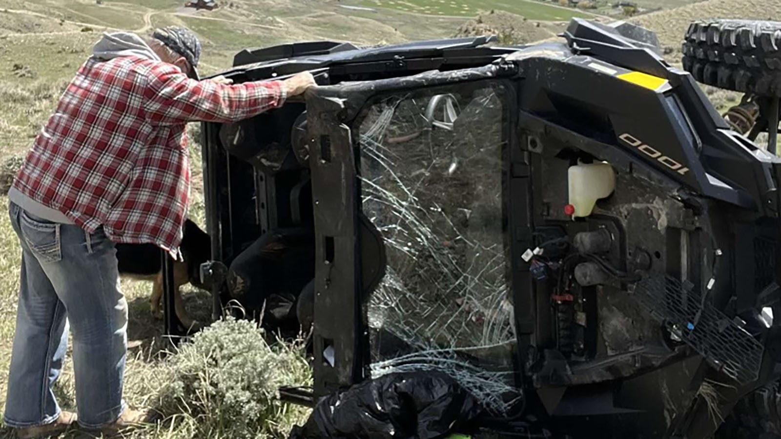 Grant Stambaugh surveys the aftermath of a side-by-side crash on Sheep Mountain in Park County that left his granddaughter’s fiancee horribly injured.