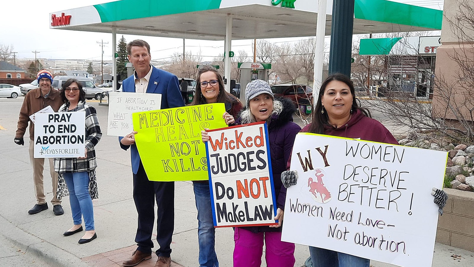 Ross Schriftman, from left, and state Reps. Tamara Trujillo, R-Cheyenne, Ben Hornok, Sarah Penn, R-Fort Washakie, Jeanette Ward, R-Casper, and Rachel Rodriguez-Williams, R-Cody, protest outside the Wellspring clinic in 2023.