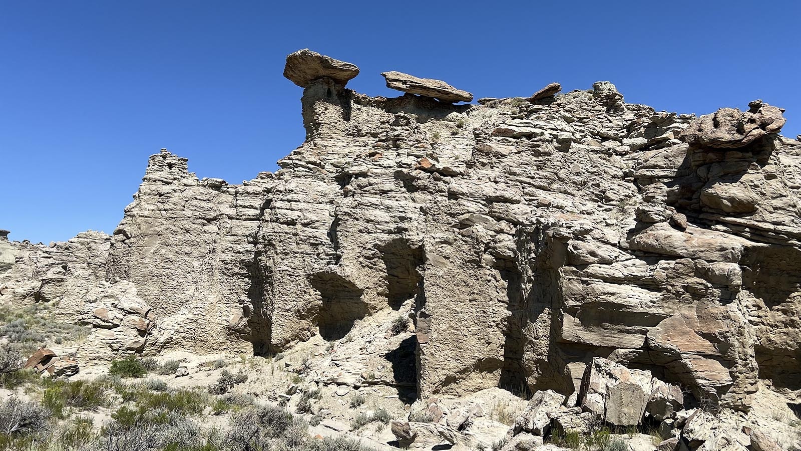 Views at Adobe Town in remote southwest Wyoming are constantly changing, because many of the features – created by wind and erosion on sandstone, are precariously balanced and could fall at any time.