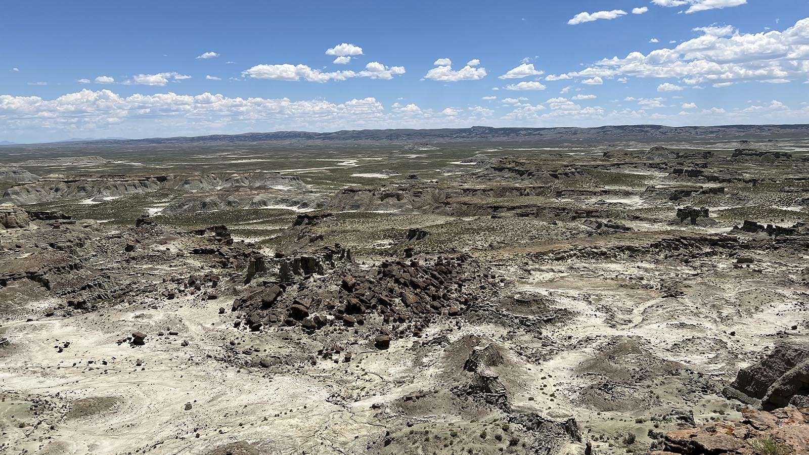 Standing on the edge of Skull Creek Rim in southwest Wyoming, the view stretches all the way to Colorado.