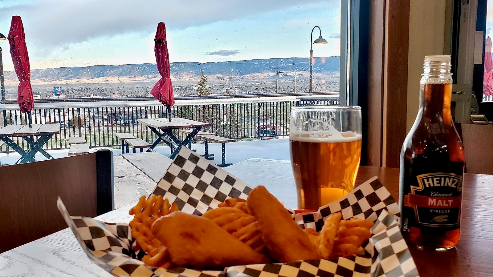 After the hike, fish and chips with a North Platte beer to watch the sunset by with Casper in the distance.