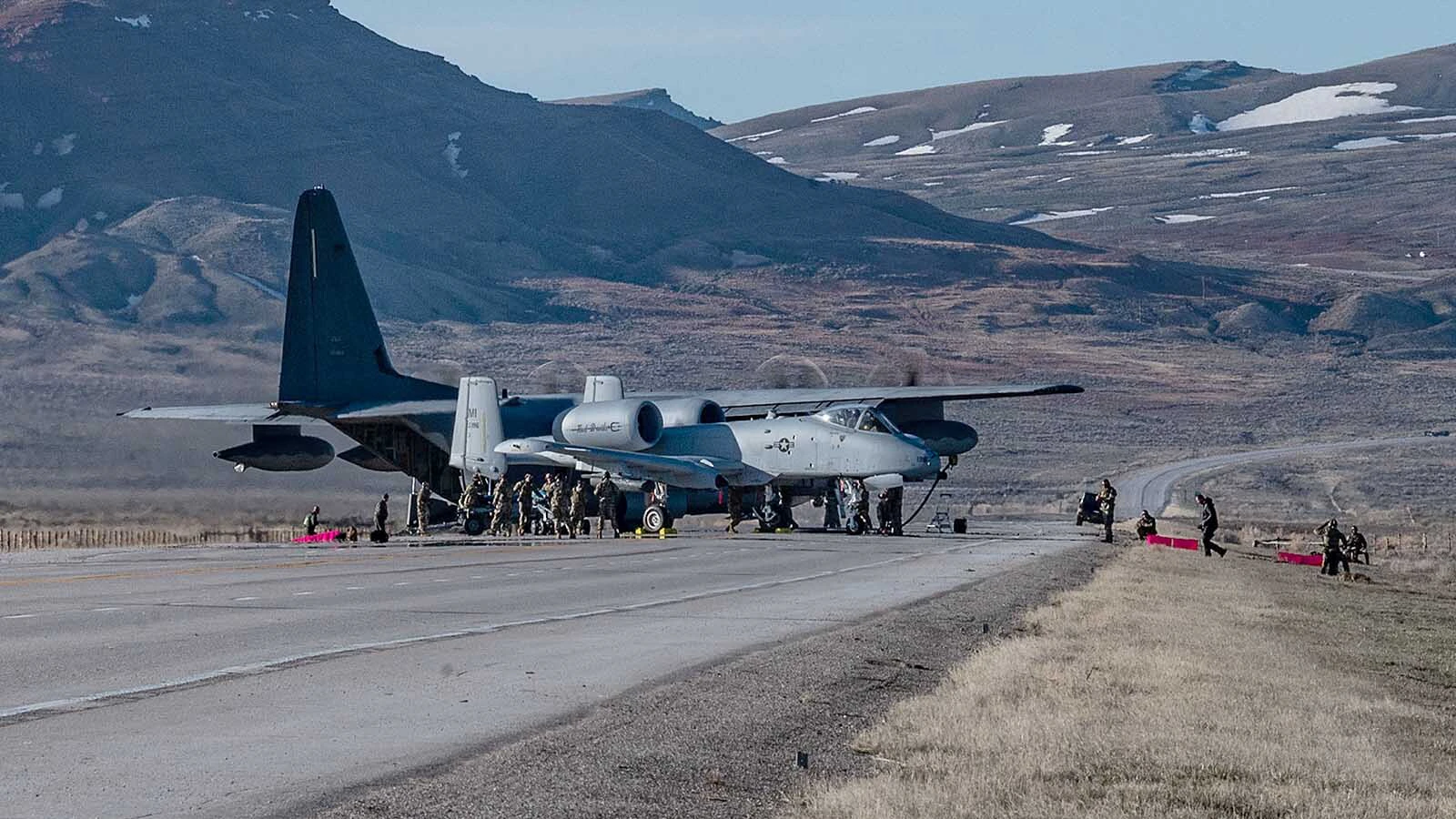An MC-130J Commando II offloads fuel to an A-10 Thunderbolt II on Highway 287 during Exercise Agile Chariot, April 30, 2023, honing capabilities linked to Agile Combat Employment.