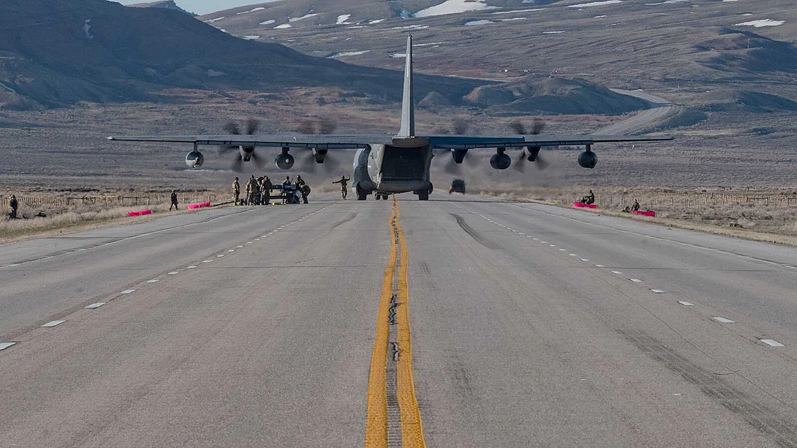 An MC-130J Commando II lands on Highway 287 during Exercise Agile Chariot, April 30, 2023, honing capabilities linked to Agile Combat Employment. Instead of relying on large, fixed bases and infrastructure, ACE uses smaller, more dispersed locations and teams to rapidly move and support aircraft, pilots, and other personnel to wherever they are needed.