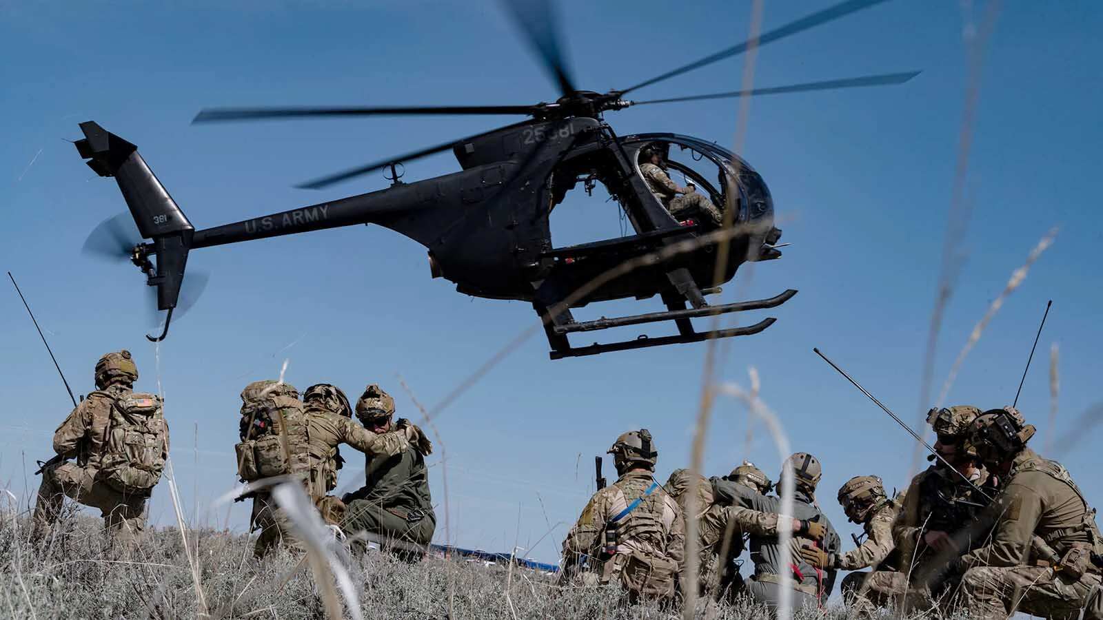 123rd Special Tactics Squadron operators load a patient on an MH-6 Little Bird during Exercise Agile Chariot, May 2, 2023, honing capabilities linked to Agile Combat Employment.