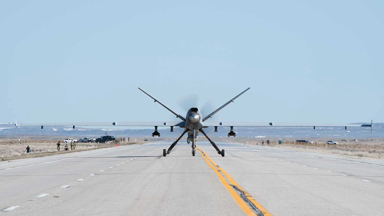An MQ-9 Reaper with the 2nd Special Operations Squadron prepares to take off Highway 287 during Exercise Agile Chariot near Rawlins, Wyoming, April 30, 2023. There are millions of miles of public roads in the United States, including federal, state, and local roads – with Agile Combat Employment, including FARPs and ICTs, it becomes millions of miles of public runways, when necessary.