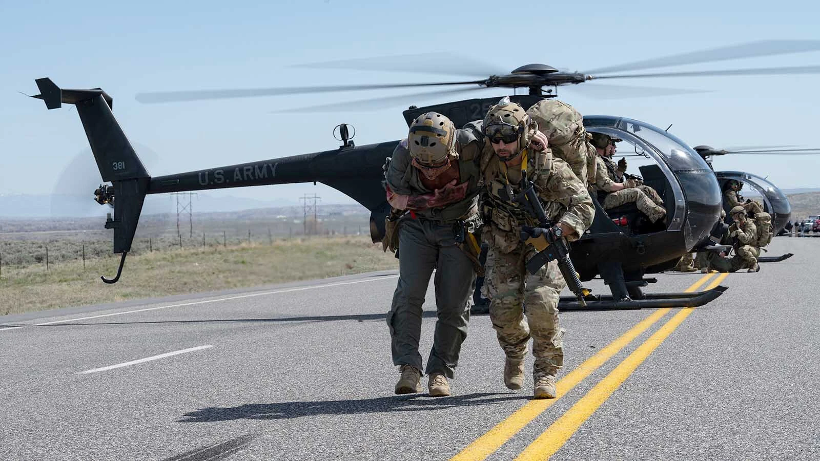 Members of the U.S. Army’s 160th Special Operation Aviation Regiment and U.S. Air Force’s 123rd Special Tactics Squadron participate in a search and rescue scenario as part of Exercise Agile Chariot, near Riverton, Wyoming, May 2, 2023. Agile Chariot tested Agile Combat Employment capabilities, including using smaller, more dispersed locations and teams to rapidly move and support aircraft, pilots, and other personnel to wherever they are needed.