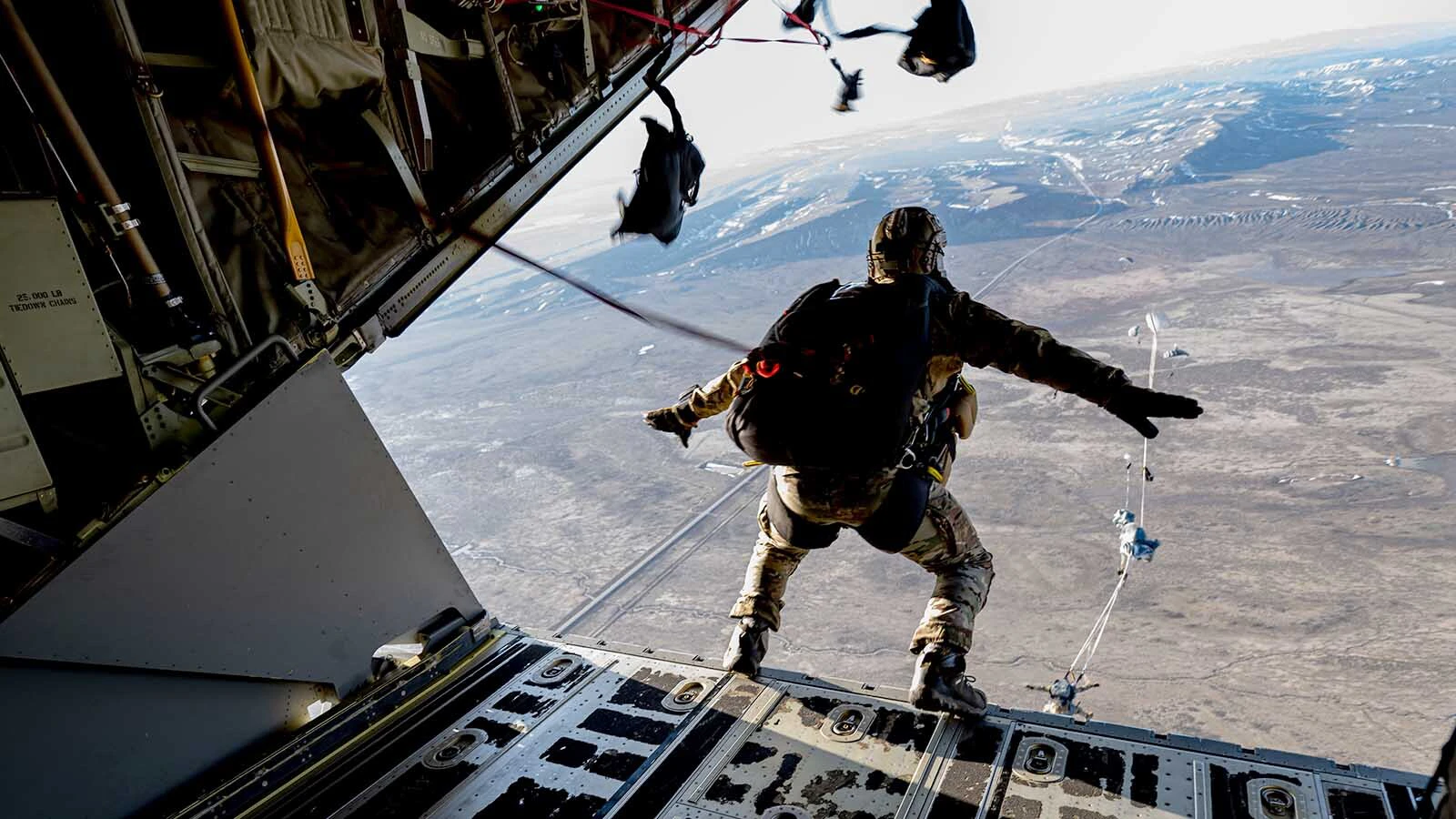 During Exercise Agile Chariot, U.S. Air Force Airmen assigned to the Kentucky Air National Guard’s 123rd Special Tactics Squadron, jump from an MC-130J Commando II near Rawlins, Wyoming, April 30, 2023. Agile Chariot tested Agile Combat Employment capabilities, including using smaller, more dispersed locations and teams to rapidly move and support aircraft, pilots, and other personnel to wherever they are needed.