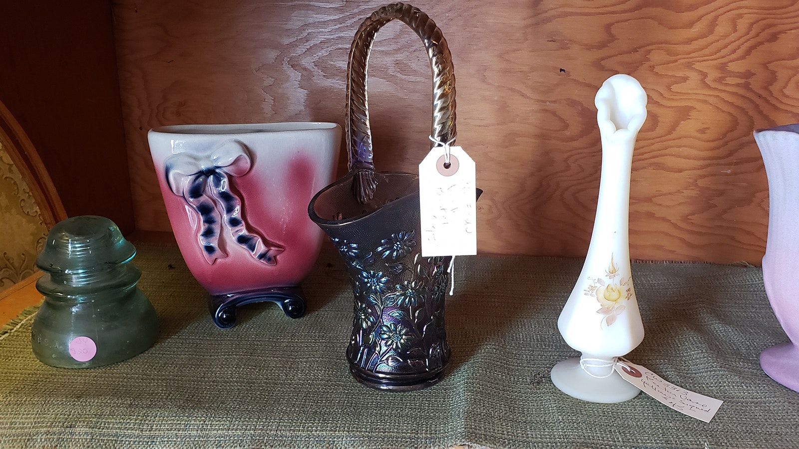A range of antique glassware is for sale in the Aladdin General Store.