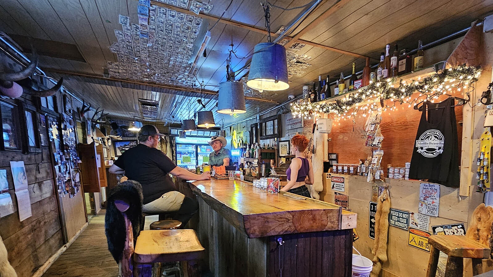 A rare quiet moment during the Sturgis Rally week at the Aladdin General Store's bar.