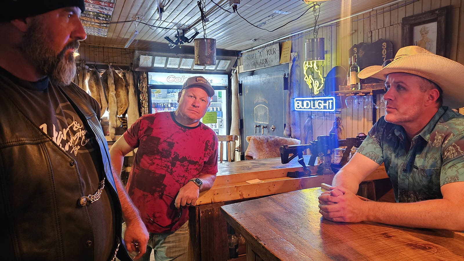 Trent Tope, right, talks to some customers at the Aladdin General Store's bar during Sturgis Rally week. The bar is popular stopping point for motorcyclists driving the Devils Tower loop.