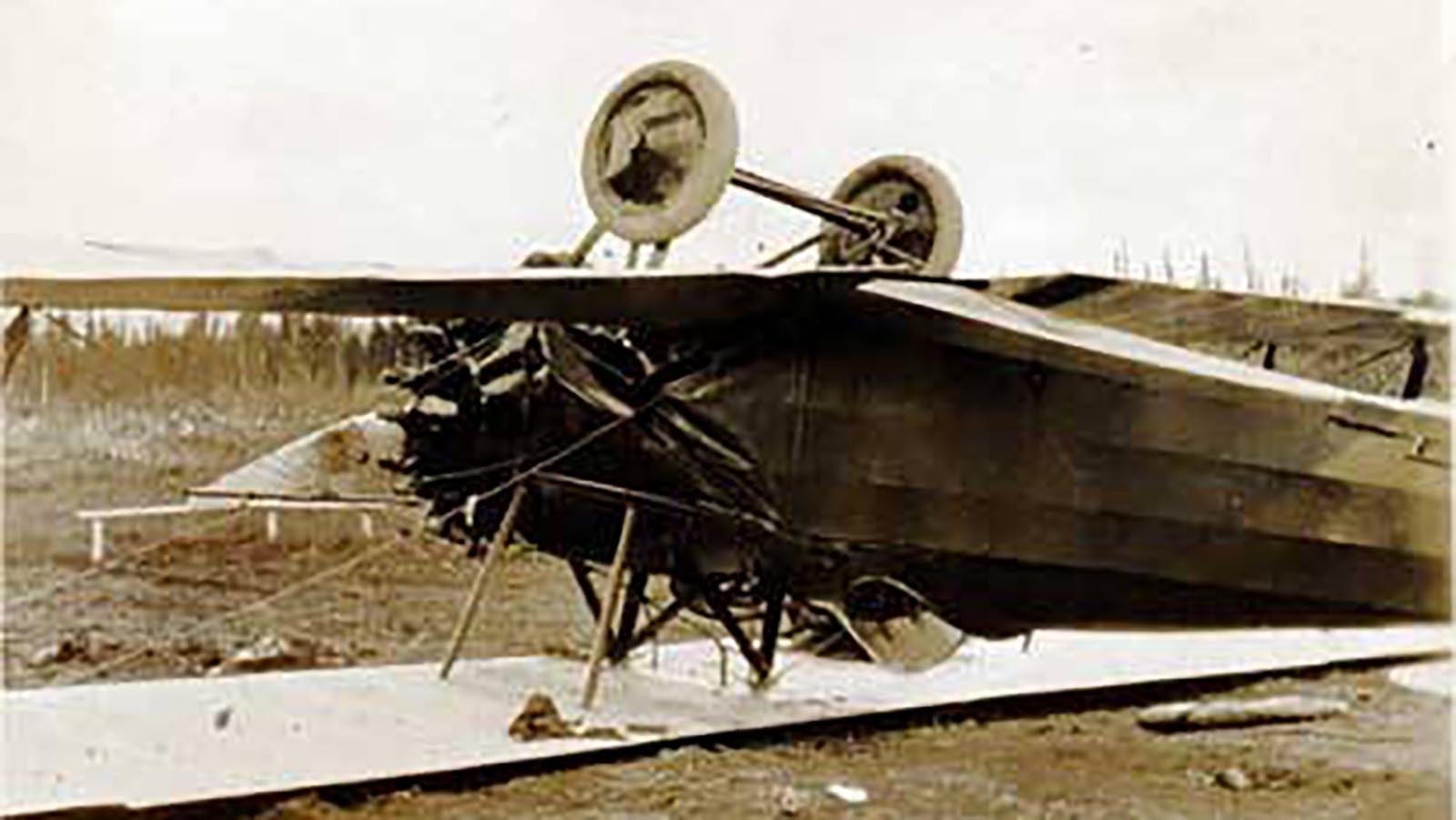 An airplane allegedly flown by Percy Hubbard is shown on its top.