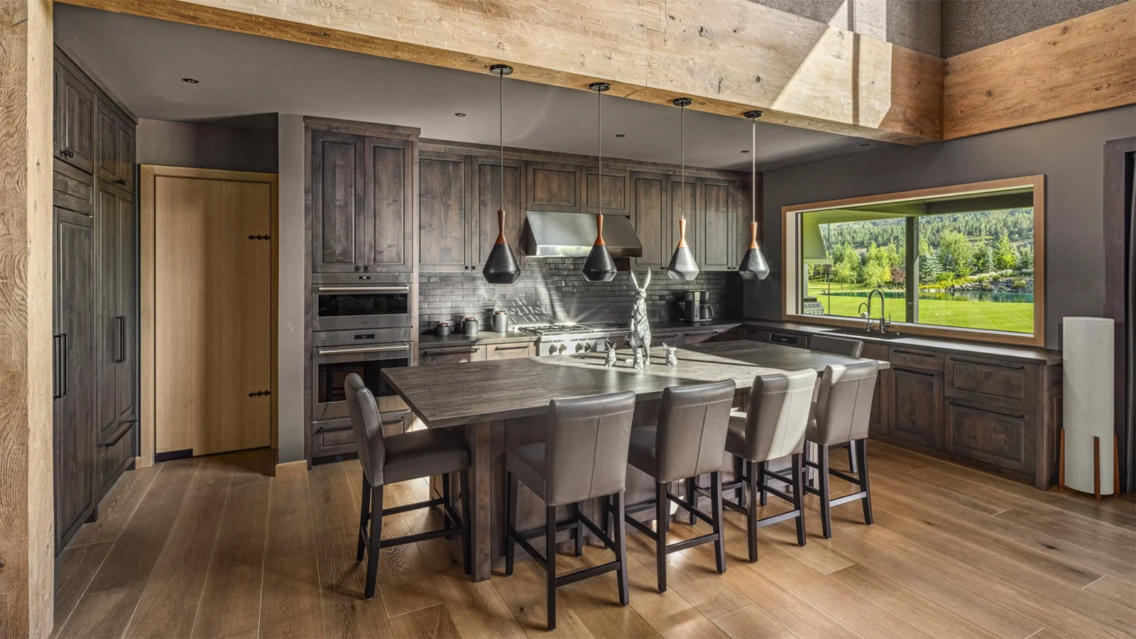 The main residence of the $48.5 million Alpine estate comes fully furnished, featuring white oak throughout with vaulted ceilings and huge picutre windows. There also are several patios with views of the Grand Tetons.