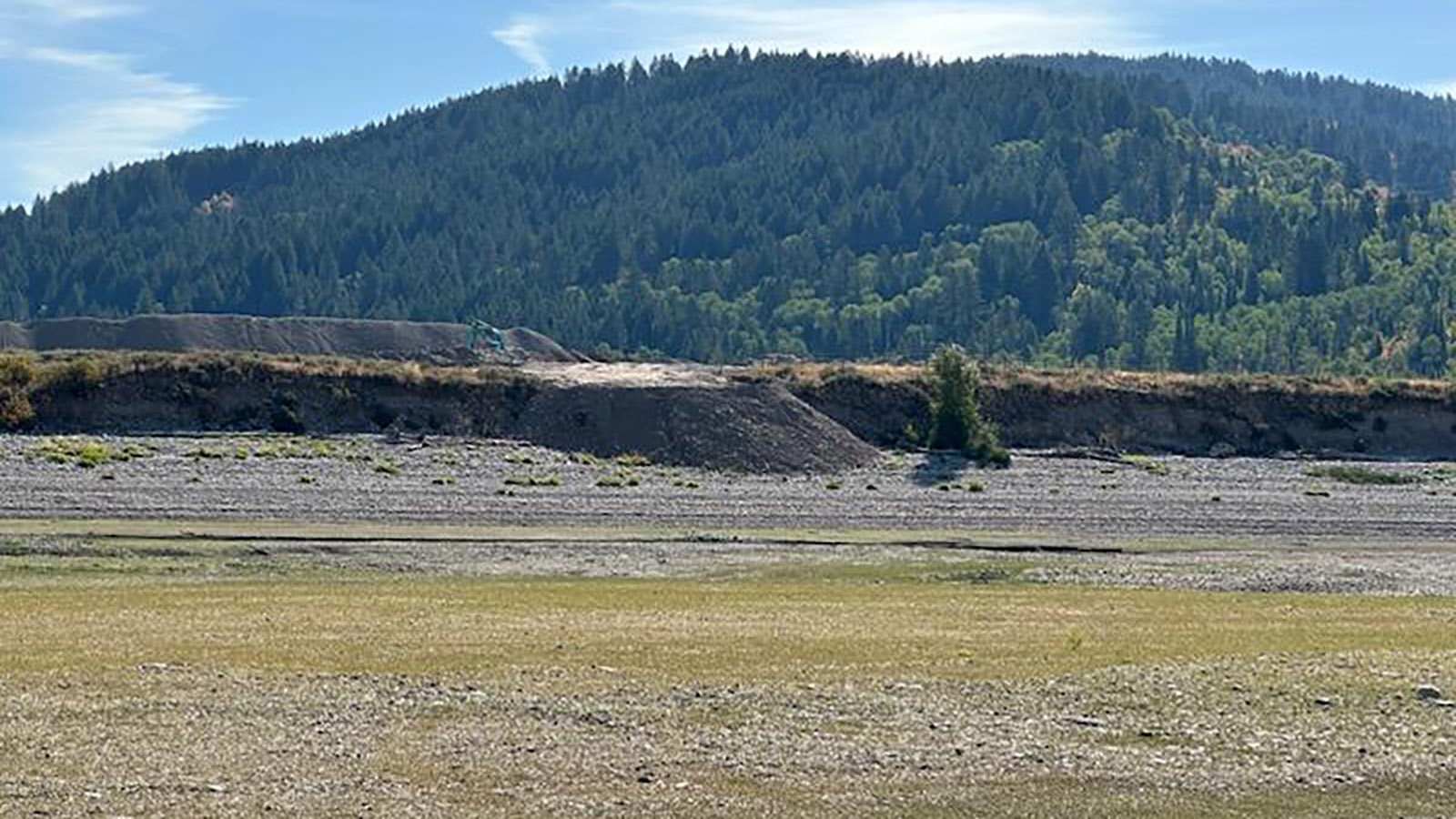 A gravel pit has operated on the edge of the little town of Alpine for 50 years. Residents are worried about a proposal to expand it by another 240 acres into undisturbed land.