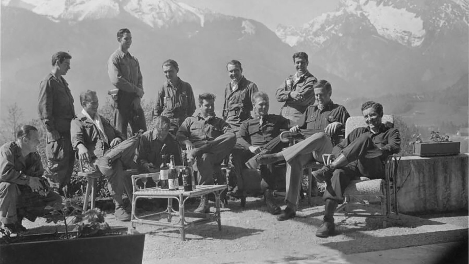 Members of the famous Easy Company in World War II post for a photo on the patio of Adolph Hitler's Eagle's Next after liberating it.