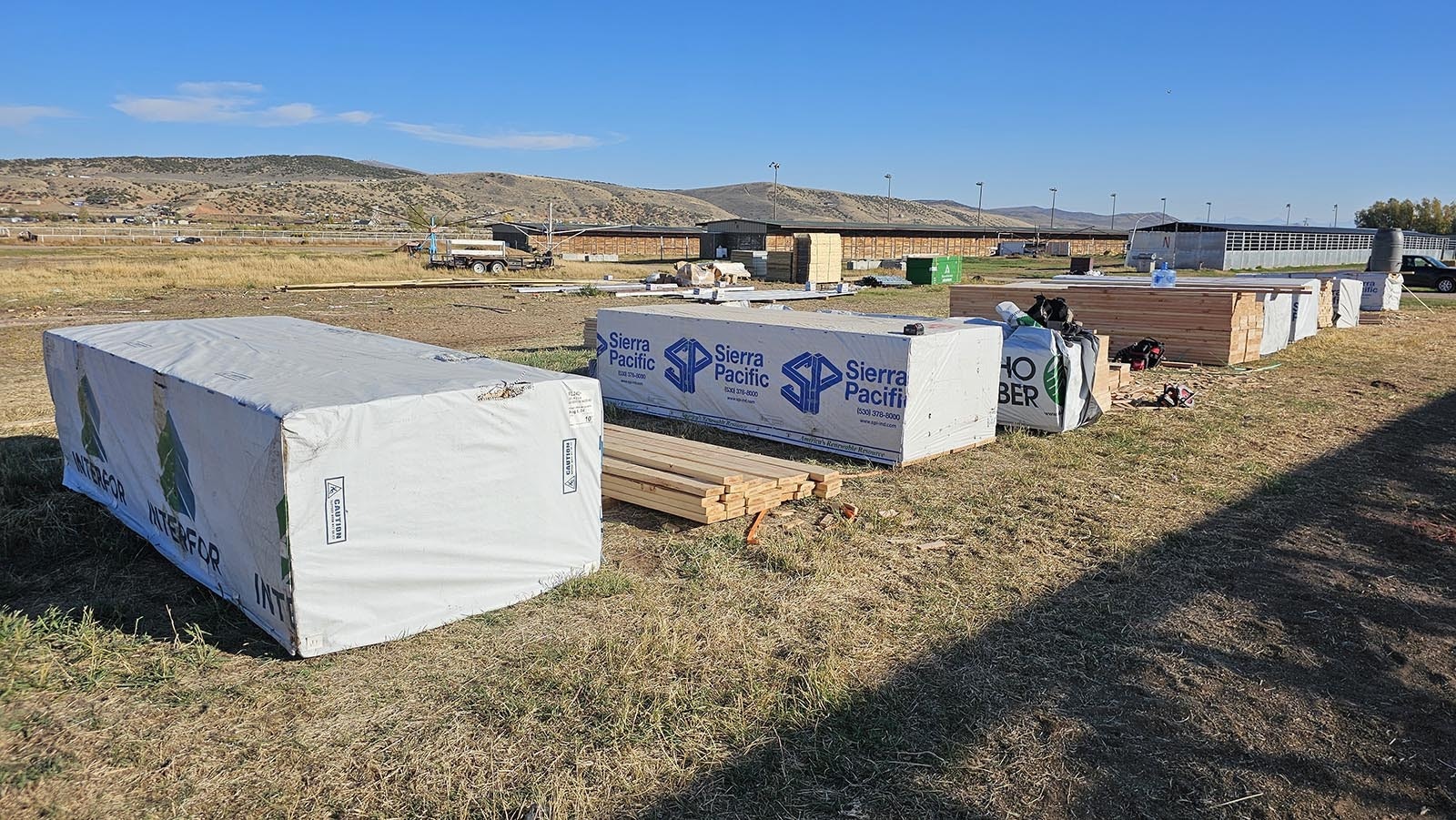 The lumber for a horse barn-stable being raised by an Amish crew was bought locally.