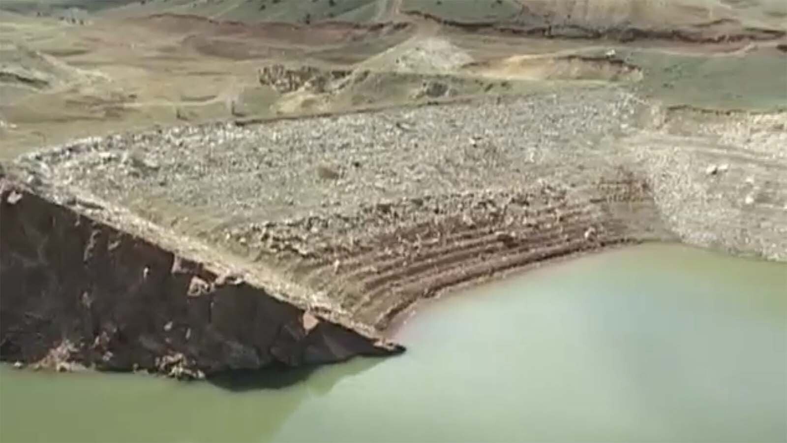 Anchor Dam in Hot Springs County, Wyoming, is technically still considered "under construction" for decades. It was never fully completed because the basin it was designed to fill doesn't hold water.