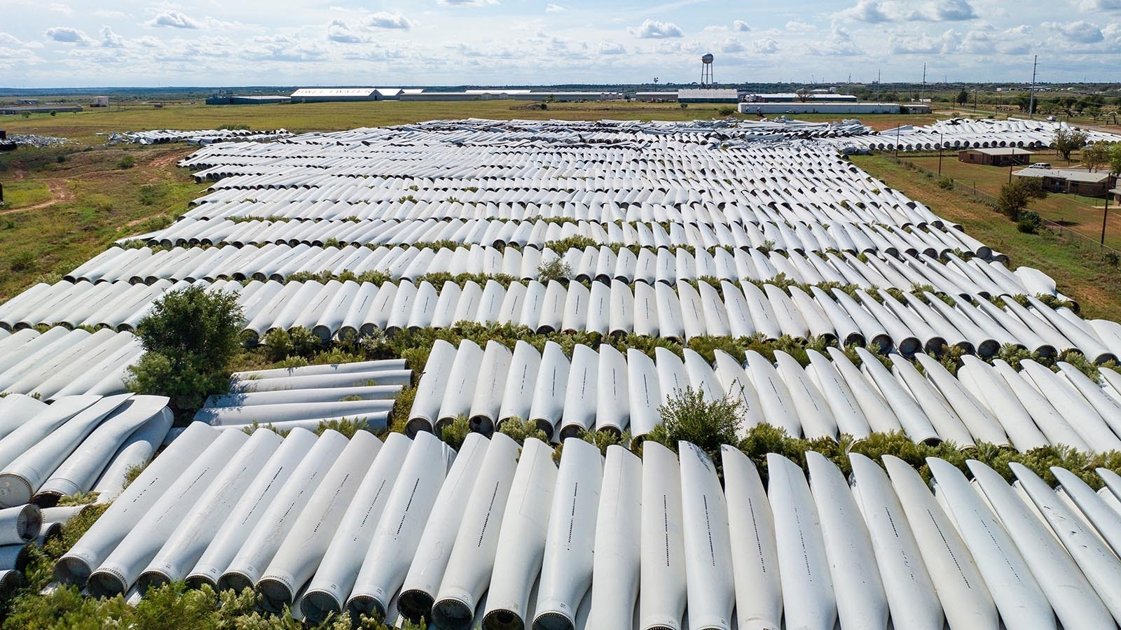 A field of discarded wind turbine blades.